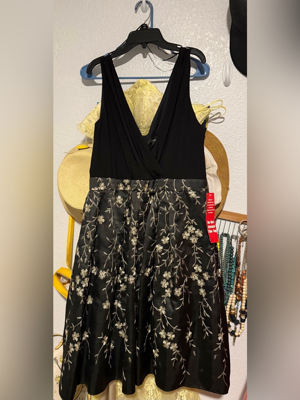 Brand new with tags R&M Richard’s elegant dress in a women’s size 14.